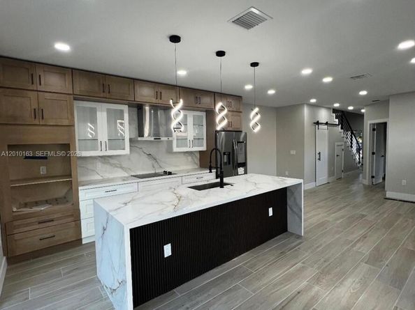 1818 NW 49 st, Miami FL 33142