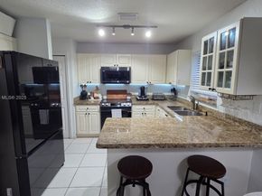 14064 S Forest Oak Cir, Davie FL 33325
