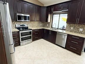 15561 Carriage Ct, Davie FL 33331