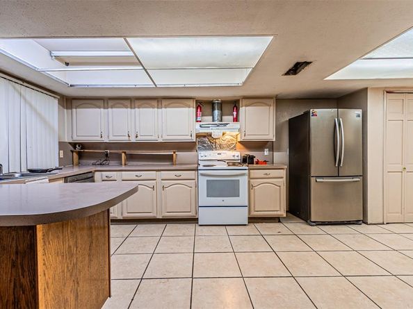 10315  Red Elm Road , Dallas Texas 75243