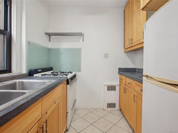96-11 65 Road 402, Rego Park NY 11374