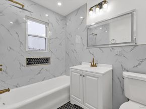 9342 204th Street, Hollis NY 11423