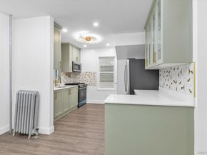 9342 204th Street, Hollis NY 11423