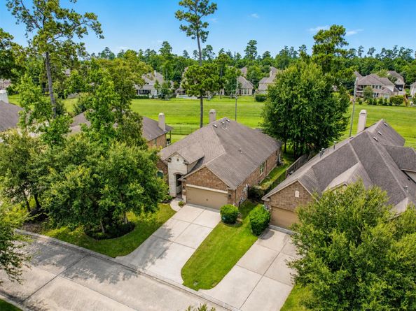 79 W Wading Pond Circle, The Woodlands TX 77375