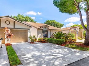 8065 Whispering Palm Drive, Boca Raton FL 33496