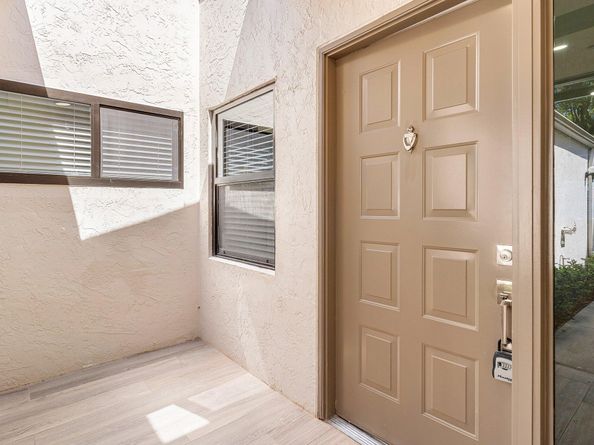 8065 Whispering Palm Drive, Boca Raton FL 33496
