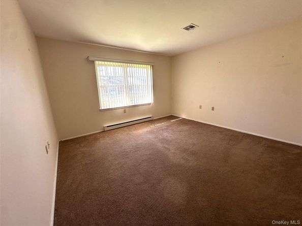 215 Woodbridge Drive A, Ridge NY 11961