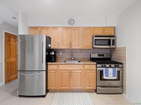 6923 66th Drive, Middle Village NY 11379