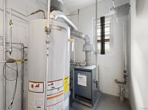 6923 66th Drive, Middle Village NY 11379