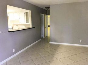 455 Golden Isles Dr 203, Hallandale Beach FL 33009