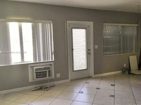 455 Golden Isles Dr 203, Hallandale Beach FL 33009