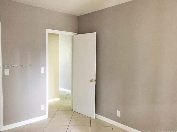 455 Golden Isles Dr 203, Hallandale Beach FL 33009