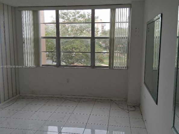 1300 Saint Charles Pl 302, Pembroke Pines FL 33026