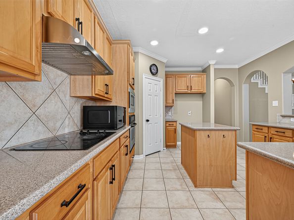 12823 Mossy Ledge Drive, Tomball TX 77377