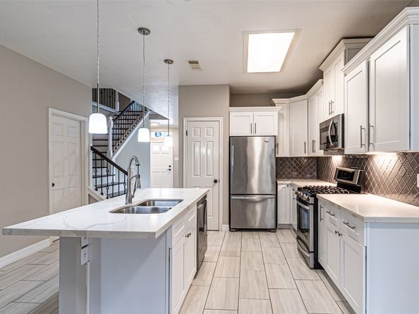 7704 Hidden Oaks Lane, Houston TX 77095