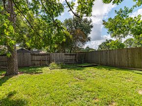 7704 Hidden Oaks Lane, Houston TX 77095