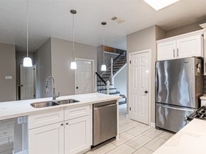7704 Hidden Oaks Lane, Houston TX 77095