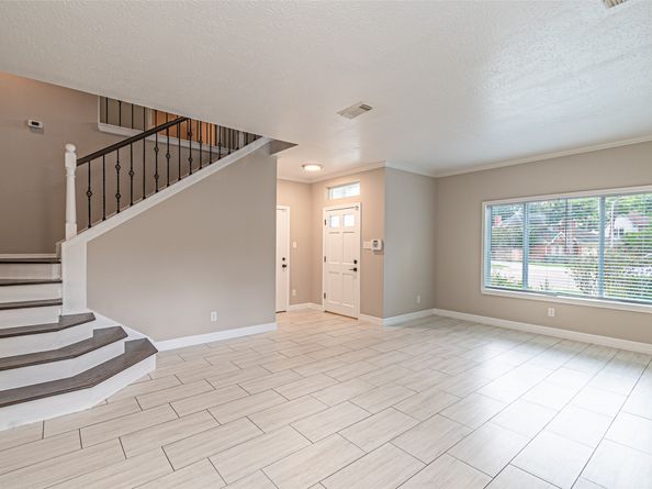 7704 Hidden Oaks Lane, Houston TX 77095