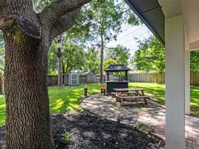 7704 Hidden Oaks Lane, Houston TX 77095