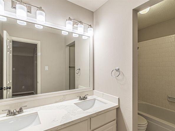 7704 Hidden Oaks Lane, Houston TX 77095