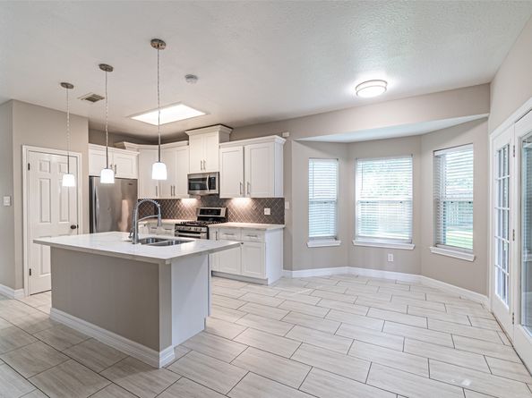 7704 Hidden Oaks Lane, Houston TX 77095