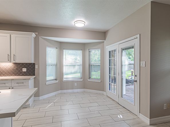7704 Hidden Oaks Lane, Houston TX 77095