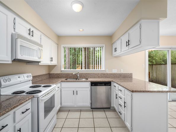 65 Hickory Oak Drive, The Woodlands TX 77381