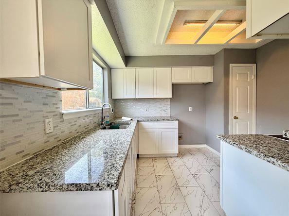 8715 Belle Glen Drive, Houston TX 77099