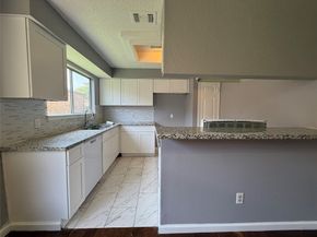 8715 Belle Glen Drive, Houston TX 77099