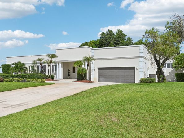 257 N Country Club Drive, Atlantis FL 33462