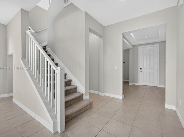 1310 Whitcombe Dr, Royal Palm Beach FL 33411