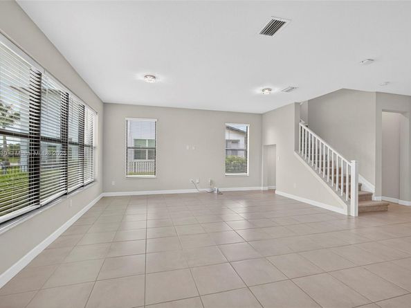 1310 Whitcombe Dr, Royal Palm Beach FL 33411