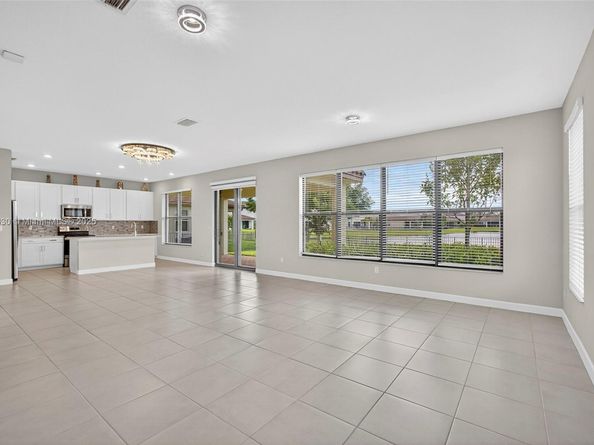 1310 Whitcombe Dr, Royal Palm Beach FL 33411