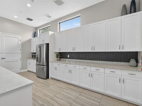 1310 Whitcombe Dr, Royal Palm Beach FL 33411