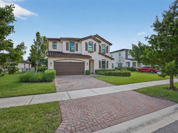 1310 Whitcombe Dr, Royal Palm Beach FL 33411