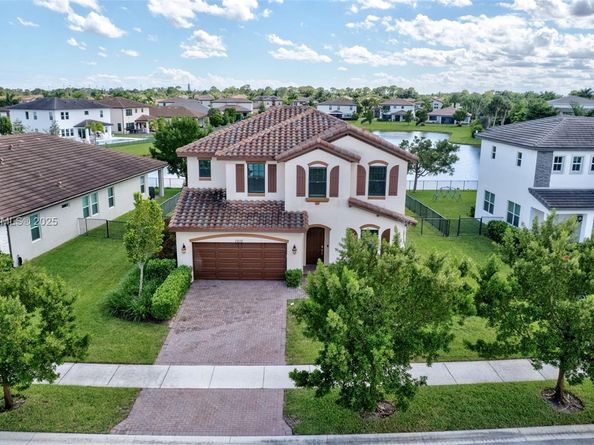 1310 Whitcombe Dr, Royal Palm Beach FL 33411