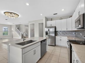 1310 Whitcombe Dr, Royal Palm Beach FL 33411