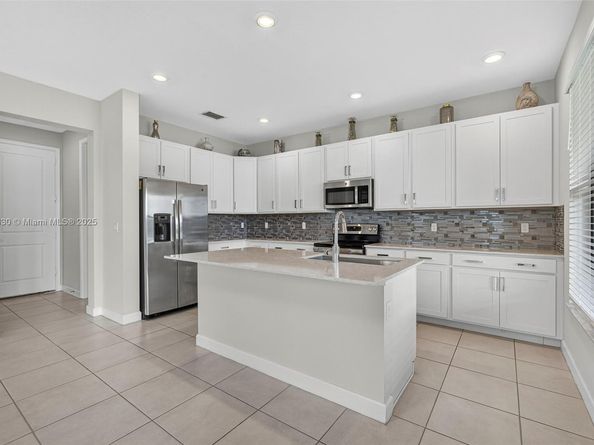 1310 Whitcombe Dr, Royal Palm Beach FL 33411
