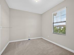 1310 Whitcombe Dr, Royal Palm Beach FL 33411