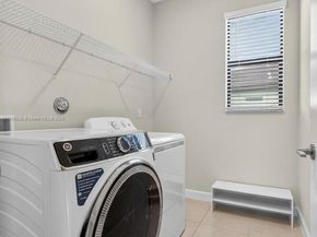 1310 Whitcombe Dr, Royal Palm Beach FL 33411