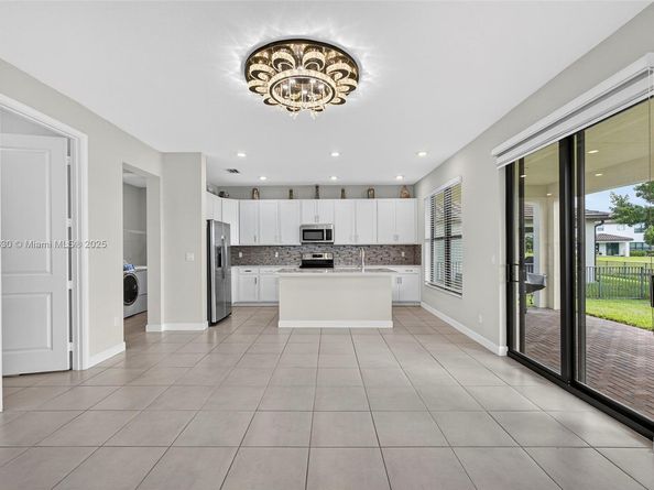 1310 Whitcombe Dr, Royal Palm Beach FL 33411