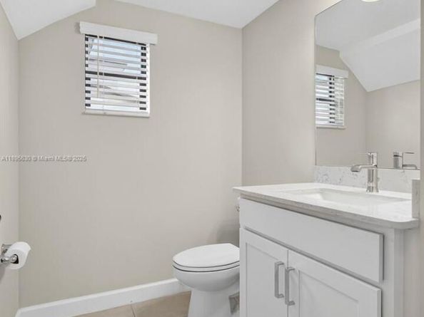 1310 Whitcombe Dr, Royal Palm Beach FL 33411