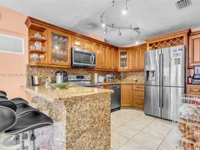 9085 Grand Canal Dr, Miami FL 33174