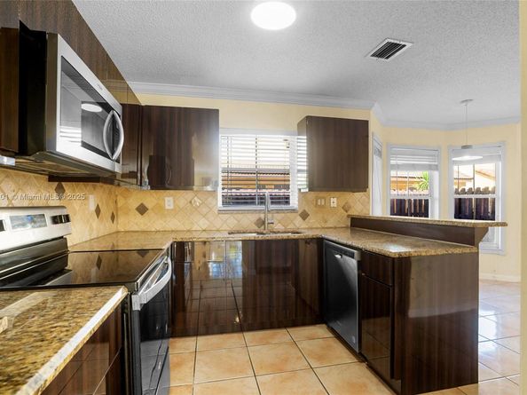239 Mahogany Ter, Davie FL 33325
