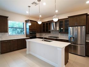 8725 Parkland Bay Dr, Parkland FL 33076