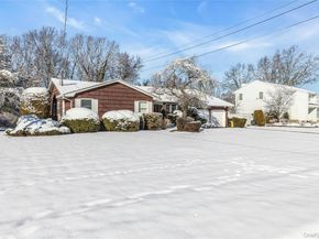 61 Hofstra Drive, Plainview NY 11803
