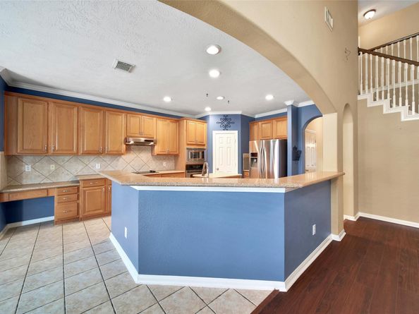 12802 Mossy Ledge Drive, Tomball TX 77377