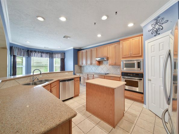 12802 Mossy Ledge Drive, Tomball TX 77377