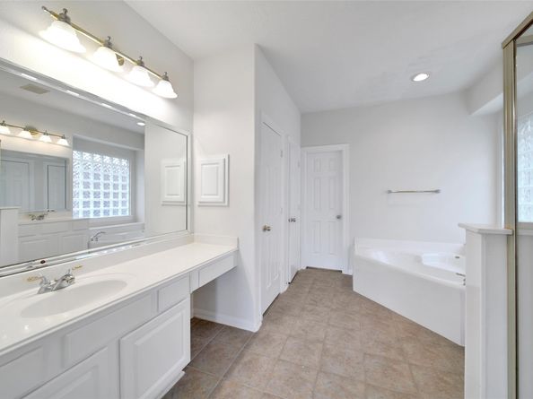 12802 Mossy Ledge Drive, Tomball TX 77377