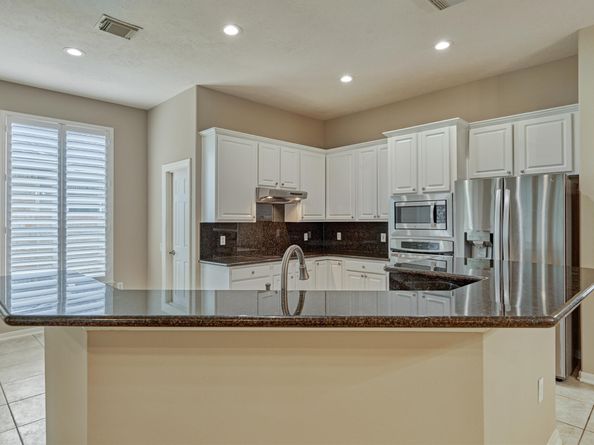 6 Wrenfield Place, The Woodlands TX 77384